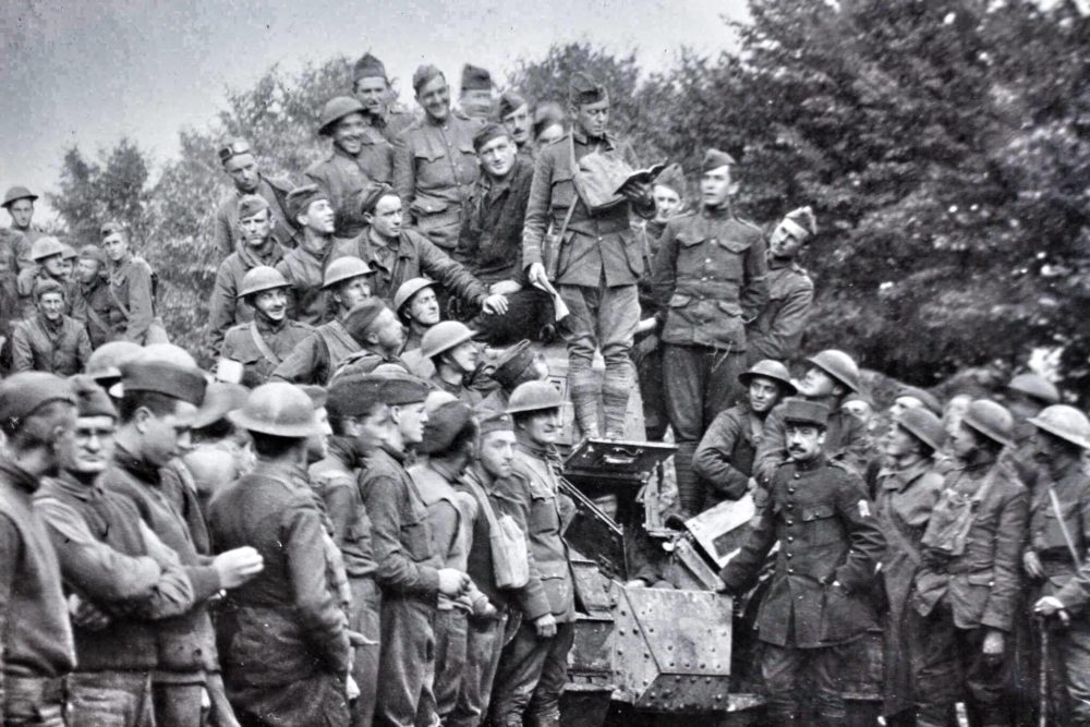 An American Army Chaplain leads worship from a Renault tank during the Meuse Argonne Campaign in October 1918