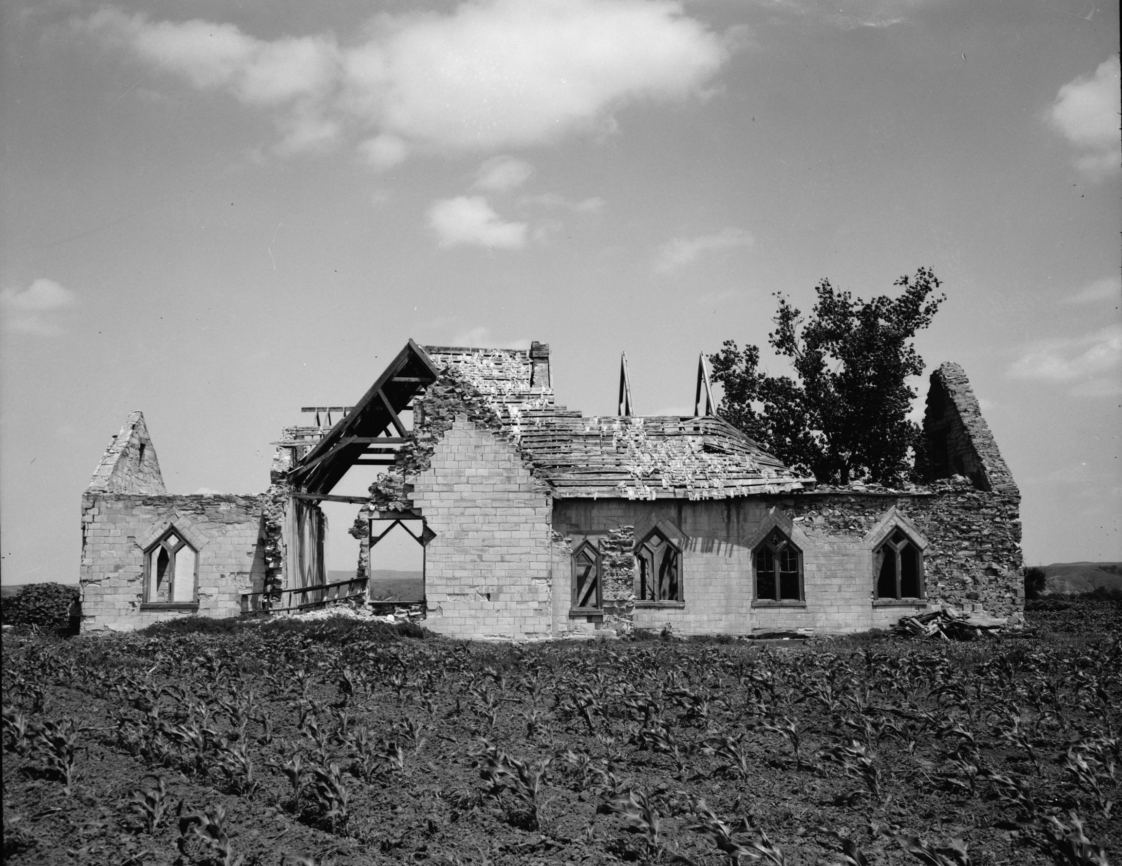 Ruins of Old Fort Randall Church on the right bank of the Missouri River in Pickstown, Charles Mix County, South Dakota, on July 9, 1947. By Roy Oglesby for Historic American Buildings Survey, via Wikimedia Commons.